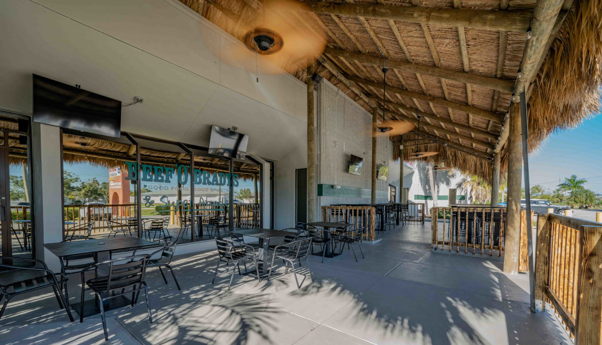 Outside bar area with tiki awning covering